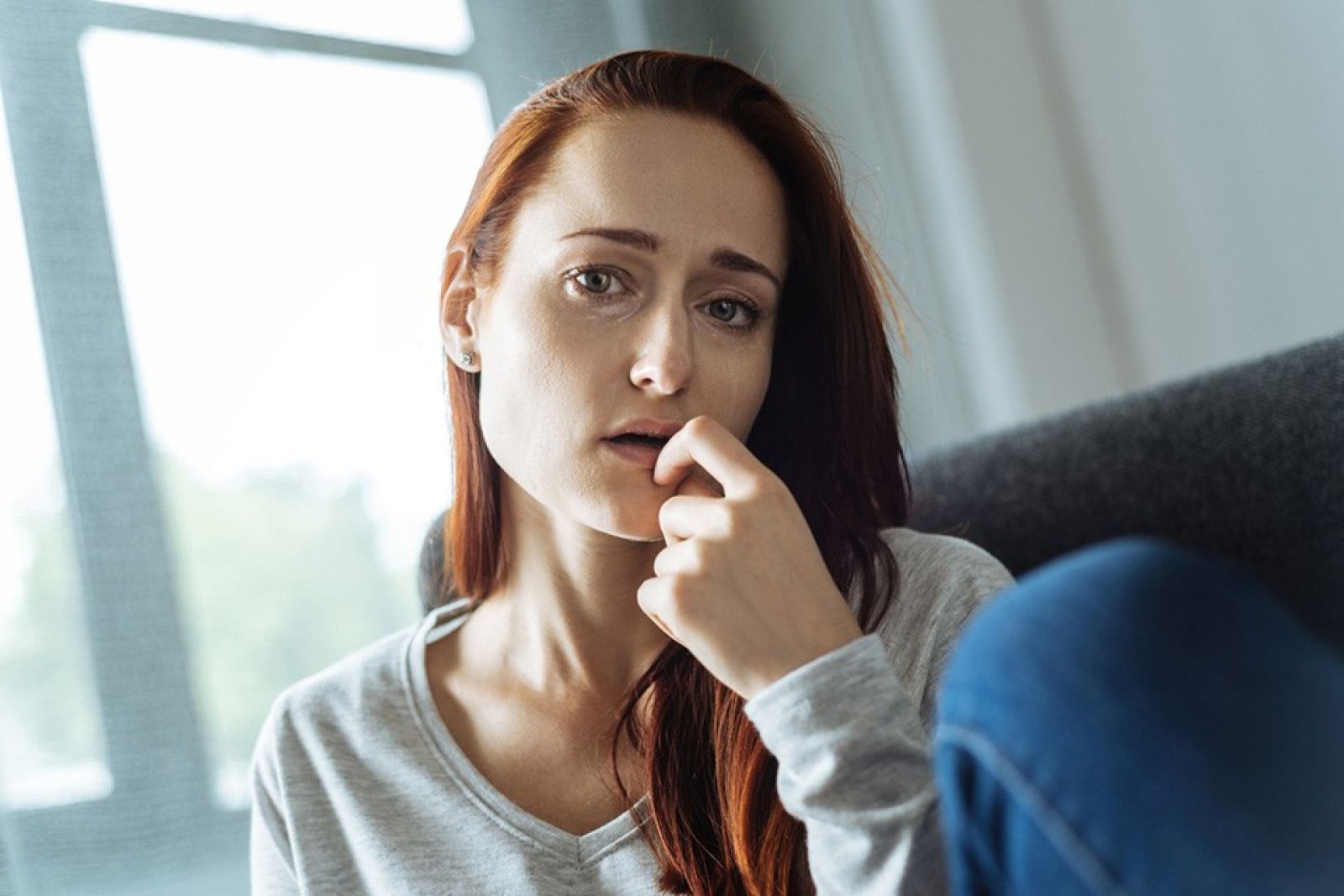 woman looking concerned