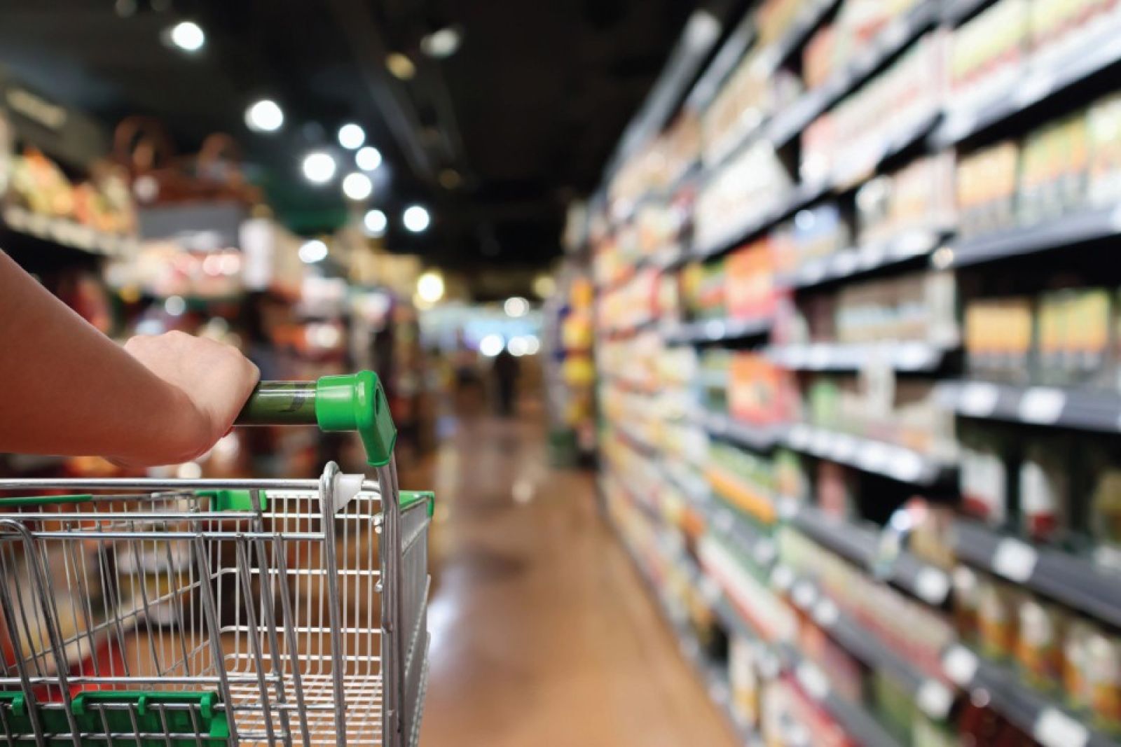 POV perspective behind cart in grocery store